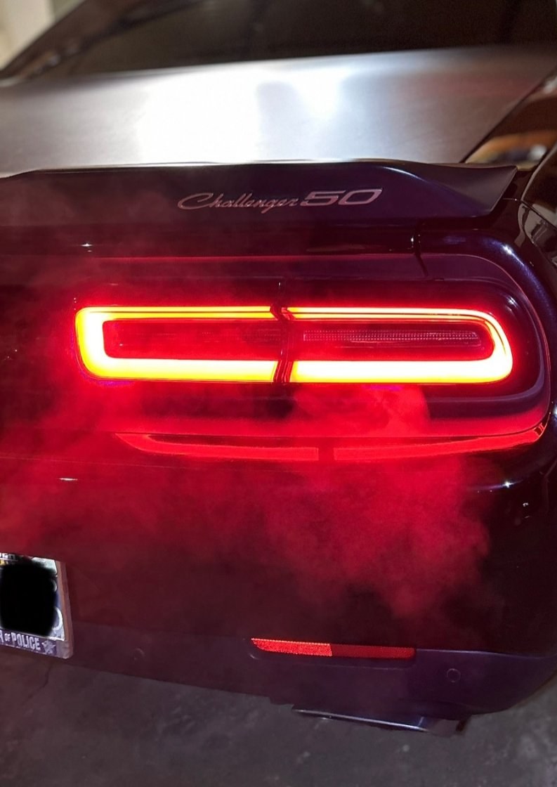 Dodge Challenger with custom red LED taillights glowing