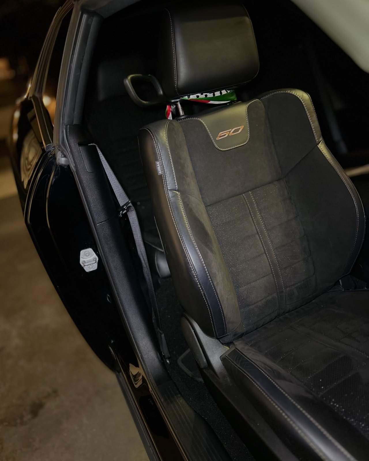 Suede cabin re-trim inside a performance car